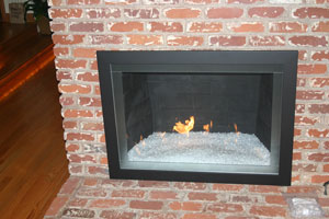 custom fireplace surround with starfire fireglass 