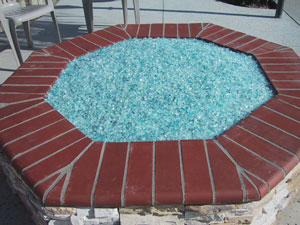 outdoor firepit with fire glass rocks