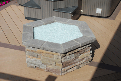 stone fire pit topped with fire crystals